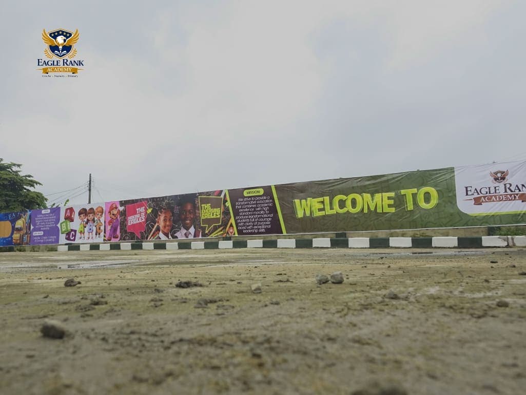 The 'Welcome to Eagle Rank Academy' entrance banner